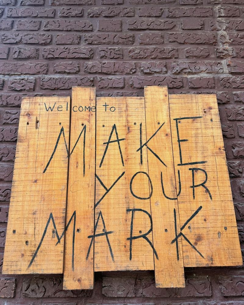 Hand-painted Make Your Mark sign