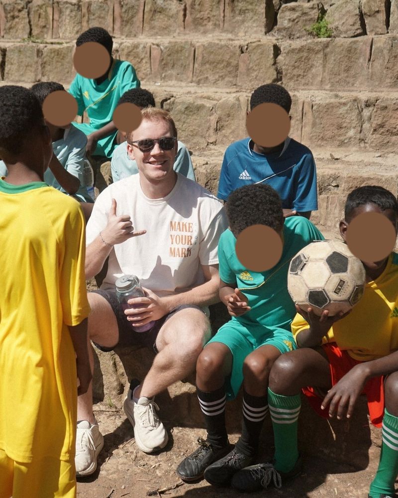 Hayden with kids after a soccer game